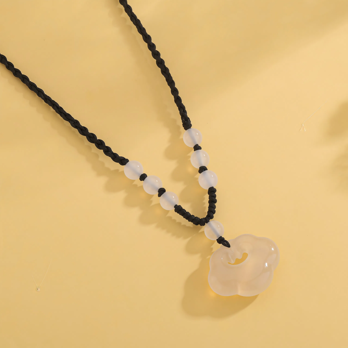 Natural Chalcedony Ruyi Auspicious Cloud Pendant - Image 2